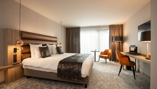Chambre exécutive spacieuse et élégante à l’Hotel Nivelles-Sud